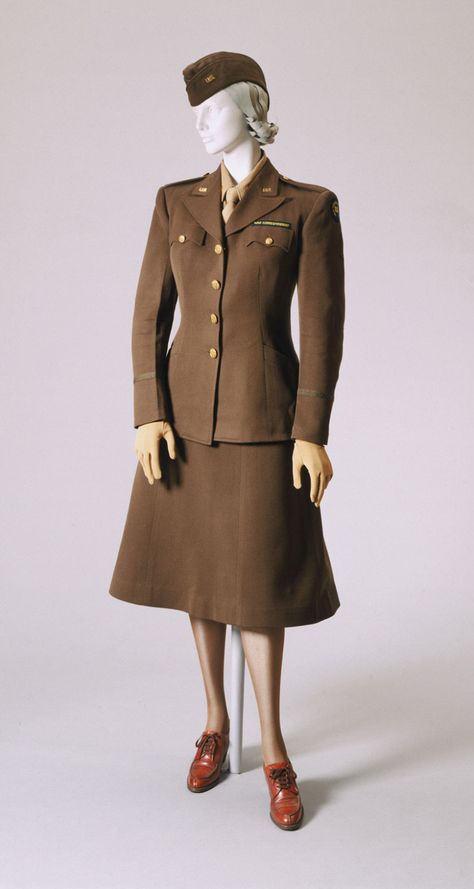 Woman's War Correspondent Uniform Artist/maker unknown, American 1945 Medium: Jacket and skirt: olive green wool; Shirt: tan rayon; Gloves: yellow cotton; Scarf: yellow rayon Wwii Women Uniform, Vintage Military Uniforms, Wwii Fashion, Ww2 Women, Wwii Women, 1940s Women, Greatest Generation, Wwii Uniforms, Ww2 Uniforms