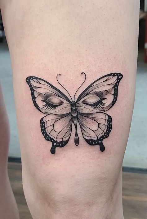 A black and grey, surrealistic butterfly tattoo with human eyes, done by @kristylynneart. Completed with some thicker black lines, dotwork shading, and fine lines! Butterfly Tattoo Designs Men, Butterfly Tattoo With Eyes, Shaded Butterfly Tattoo, Butterfly Tattoo For Women, Back Of Neck Tattoo Men, White Butterfly Tattoo, Skull Butterfly Tattoo, Butterfly Wing Tattoo, Butterfly Neck Tattoo