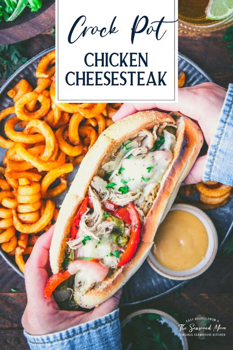 The classic Philly chicken cheesesteak becomes an easy weeknight dinner -- thanks to the convenience of a slow cooker! With garlic, peppers, onions, Italian seasoning, and melted provolone cheese, this simple Crock Pot chicken cheesesteak recipe is full of satisfying flavor. Serve the tender, juicy shredded chicken on toasted hoagie rolls, and pair the sandwiches with a simple green salad, French fries, or crunchy potato chips. Sloppy Chicken Sandwiches, Crockpot Chicken Philly Cheesesteak, Chicken Philly Cheesesteak Crockpot, Slow Cooker Chicken Philly Cheesesteak, Crockpot Chicken Sandwiches, Crock Pot Frozen Chicken Recipes, Chicken Cheesesteak Recipe, Chicken Philly Cheesesteak, Chicken Cheesesteak