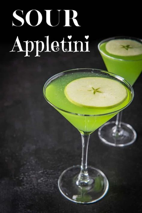 Be prepared to pucker up with this appletini cocktail. This recipe has a sour edge to it but is so delicious that you'll smack your lips after every sip. It has a gorgeous green color and perfect to serve at your St. Patrick's day celebration. #appletini #stpatricksday #cocktail #dishesdelish Sour Apple Cocktail Recipes, Drinks With Apple Pucker, Drinks With Sour Apple Pucker, Apple Pucker Cocktails, Green Colored Cocktails, Pucker Drinks Recipes, Appletini Recipe Martinis, Before Dinner Cocktails, Sour Apple Pucker Drinks