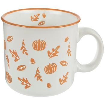 Dimensions: 4" H x 5.56" W x 4.25" D Volume: 20.4 Ounces (605ml) Material: Ceramic Color: White & Orange Care & Safety: Food, Dishwasher & Microwave Safe Quantity: 1 Pour yourself a warm cup of apple cider in a festive, fall-inspired mug! Pumpkin, Leaf & Acorn Ceramic Mug features a white base debossed with orange pumpkins, leaves, and acorns. A few leaves and an acorn even snuck inside the mug as well. Have this mug in hand while you spend the cool autumn nights with friends and family! Mug Art Ideas, Acorn Ceramic, Fall Pottery, Creative Mug, Halloween Aesthetics, Fall Mugs, Pumpkin Leaf, Plain Mugs, Cool Autumn