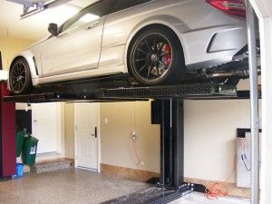 auto lift in a home garage Honda Indy Toronto, Auto Lift, Customer Profile, Garage Design Interior, Garage Lift, Ultimate Garage, Car Ramps, Window Display Design, Garage Interior