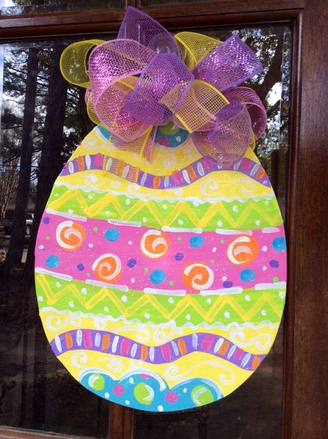 Wooden Easter egg door hanger Easter Wood Crafts Diy, Diy Door Hangers, Easter Egg Door Hanger, Easter Yard Decorations, Easter Paintings, Easter Wood Crafts, Easter Door Hanger, Wooden Door Hanger, Spring Easter Crafts