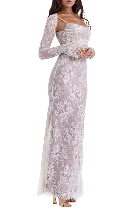 Dreamy floral lace cascades stunningly down your figure in a sweeping maxi dress shaped with delicate ruching at the waist and framed by fitted long sleeves. Exclusive retailer   Hidden side-zip closure   Square neck   Long sleeves   Lined   62% recycled polyamide, 38% polyamide; 80% polyamide, 20% elastane; 100% polyester; 100% polyamide   Dry clean   Imported Dantel Dresses Long, Dantel Dress, Long Sleeve Lace Maxi Dress, Lace Dress With Sleeves, Square Neck Dress, Vintage Maxi Dress, House Of Cb, Lace Maxi, New York Wedding