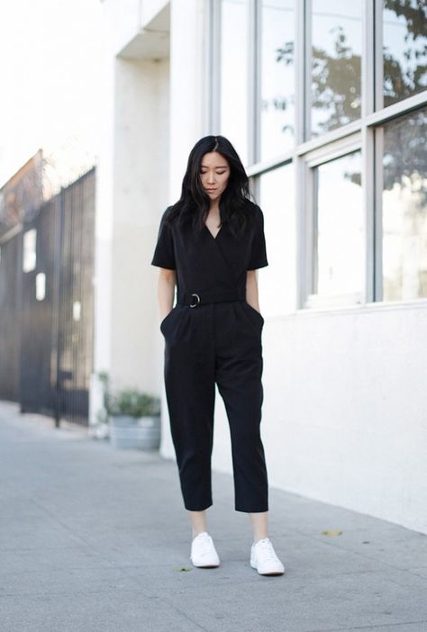 Blogger Andy Heart wears a belted black jumpsuit with white sneakers Jumpsuit Outfit Casual Sneakers, Black Jumpsuit Outfit Casual, Black Jumpsuit Outfit, Jumpsuit Outfit Casual, Suits And Sneakers, Outfits New York, Nyc Outfits, Jumpsuit Outfits, Boiler Suit