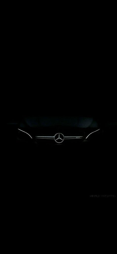 Black Mercedes Wallpaper Iphone, Mercedes Benz Light Up Logo, Black Benz Wallpaper, Mercedes Benz Background, Mercedes Dark Wallpaper, Mercedes Headlights Wallpaper, Mercedes Dark Aesthetic, Mercedes Logo Aesthetic, Mercedes Wallpaper Luxury