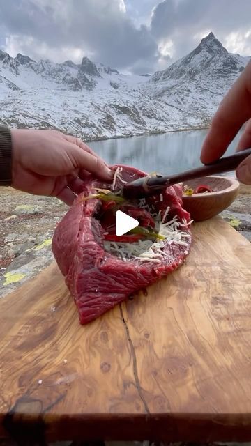 @eatinghealthytoday on Instagram: "Cooking Stuffed Beef on a Swedish Log Stove 🏔🥩🪵
(via: @karadenizli.maceraci)

Follow @eatinghealthytoday for more food videos! ✨

#outdoors #outdoorcooking #camp #outdoor #food #cooking #foodvideo #survival #bushcraft #nature #wild #natural #foodvideos #hungry #crunch #wilderness #passion #relax #camping #adventures #mountains #snow #asmr #wood #foodporn #cookingadventures #meatlovers" Hot Beef Commercial, Campfire Cooking Videos, Cooking In The Wilderness, Forest School Campfire Cooking, Bushcraft Cooking, Stuffed Beef, Wilderness Skills, Survival Bushcraft, Mountains Snow