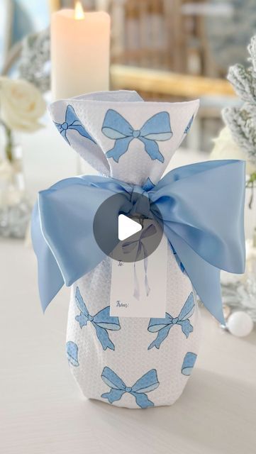 Stephanie Veltri on Instagram: "Like & comment “SHOP” to instantly receive links in your DM. 💙🎀

For small business Saturday I am sharing a tutorial on how to wrap a pretty bottle of bubbly in a towel! It’s perfect for holiday gifting all tied up in a pretty bow.  I purchased the towel and gift tags from @thepolishedprep.  Always support small businesses especially during the holidays!💙🎄 Just a note that the items are 20% this weekend!  I think this is the perfect way to gift a bottle of wine or champagne in such a pretty way, don’t you? 💙🍾

I purchased the Gift Tag Set and Towel from @thepolishedprep .  Always support small businesses especially during the holidays!💙🎄

#hostessgift #gift #wine #champagne #floralarrangement #christmasgift #christmaspresent #roses #diy" Gift Wrapping Techniques, Wrapping Techniques, How To Wrap, Gift Wine, Small Business Saturday, A Bottle Of Wine, Small Bottles, Bottle Of Wine, Tie Bow