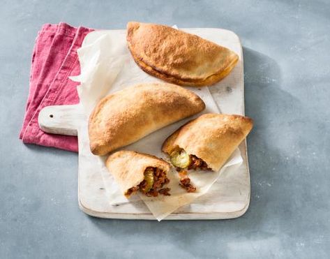 Have a cheeseburger anytime by keeping this handheld version in your freezer for busy weeknights. Cheeseburger Calzone, Dill Pickle Slices, Calzone Recipe, Weekend Dinner, Giant Food, Beef Recipes For Dinner, Freezer Meals, Hot Dog Buns, Cheeseburger