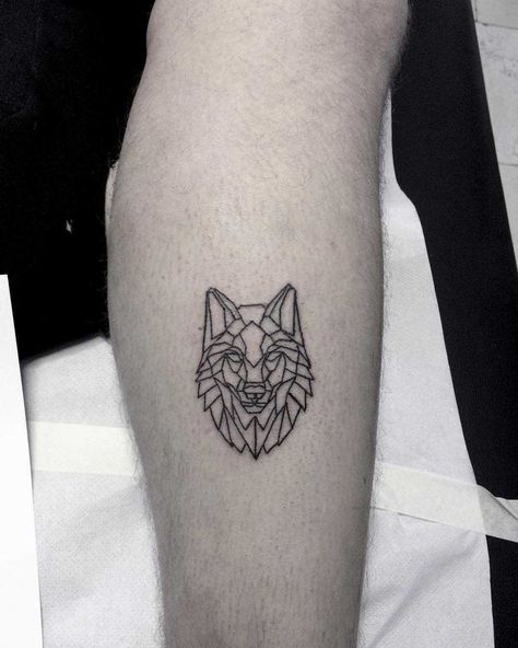 Geometric wolf head tattoo on the calf Mini Wolf Tattoo, Small Wolf Head Tattoo, Wolf Line Tattoo Design, Wolf Head Tattoo Design, Wolf Geometric Tattoo Design, Wolf Head Tattoo, Wolf Face Tattoo, Husky Tattoo, Small Wolf Tattoo