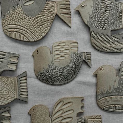 Kate Clark - Carved Modern Rustic Pottery on Instagram: "Birds for your wall. Do you have a favourite? I’ve always thought they’d look very effective displayed as a group, don’t you think? The body is intentionally slightly curved to give it dimension. Did you know they’re available in my online shop? They’ve been popular in my gallery stockists." Ceramic Bird Wall Art, Ceramic Flying Birds, Ceramic Birds Wall, Pottery Wall Art, Clay Birds, Pottery Animals, Rustic Pottery, Pottery Handbuilding, Country Shop