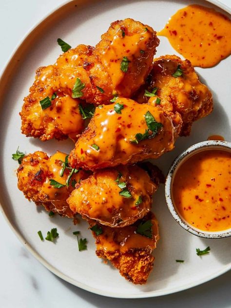 Crispy bang bang chicken tossed in a sweet and spicy sauce—perfect for game day or sharing with friends. Bang Bang Chicken Tenders, Crispy Bang Bang Chicken, Bang Bang Chicken Tacos, Longhorn Spicy Chicken Bites, Longhorn Spicy Chicken Bites Recipe, Spicy Chicken Bites, Chicken Bites Recipe, Chicken Bites Recipes, Sharing With Friends