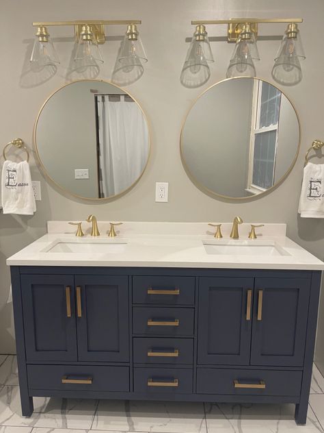 I love how this navy and brush gold compliment each other. So refreshing. Walls are Sherwin Williams Repose gray. Gray Navy Bathroom, Gray Bathroom Walls Gold Accents, Blue Grey And Gold Bathroom, What Color Compliments Navy Blue, Gold And Dark Blue Bathroom, Navy Grey And Gold Bathroom, Navy And Tan Bathroom, Navy And Beige Bathroom, Navy Blue Gold Bathroom