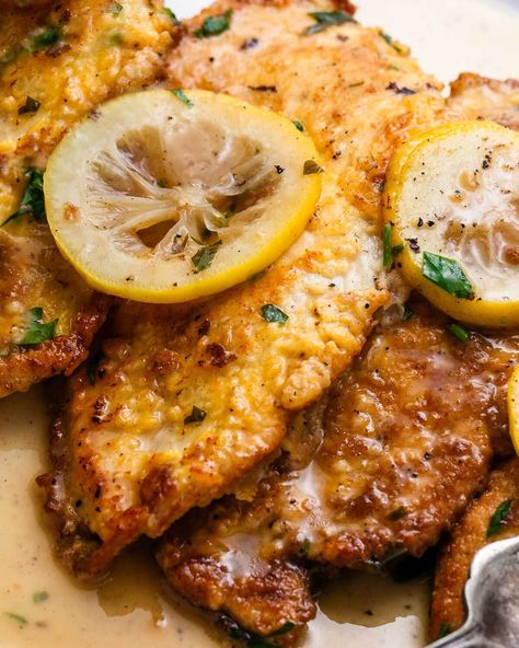 This classic Chicken Francese combines thinly sliced cutlets that are gently fried and simmered in a buttery white wine and lemon sauce and finished with fresh parsley. A must for the lemon lover in your life! #chickenfrancese #chicken #italianfood White Wine Lemon Butter Sauce, Egg Wash Recipe, Sliced Chicken Breast Recipes, Chicken Francaise Recipe, Sip And Feast, Fried Chicken Cutlets, Chicken Francese, Chicken Cutlet Recipes, Italian Chicken Recipes