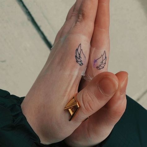 Small Finger Tattoos Matching, Sadistic Tattoos, Angel Wings Matching Tattoo, Small Matching Finger Tattoos For Best Friends, Angel Wing Matching Tattoo, Finger Angel Wing Tattoo, Finger Tattoos Angel Wings, Wings Matching Tattoo, Matching Wings Tattoo