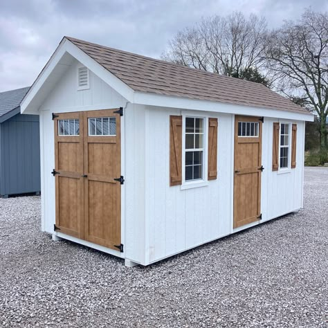 Shed Skirting Ideas, Barn Shed Ideas, Outdoor Storage Buildings, Sheds Ideas Backyard, Carriage Style Garage Doors, Farmhouse Sheds, Wooden Storage Sheds, Backyard Barn, Yard Sheds