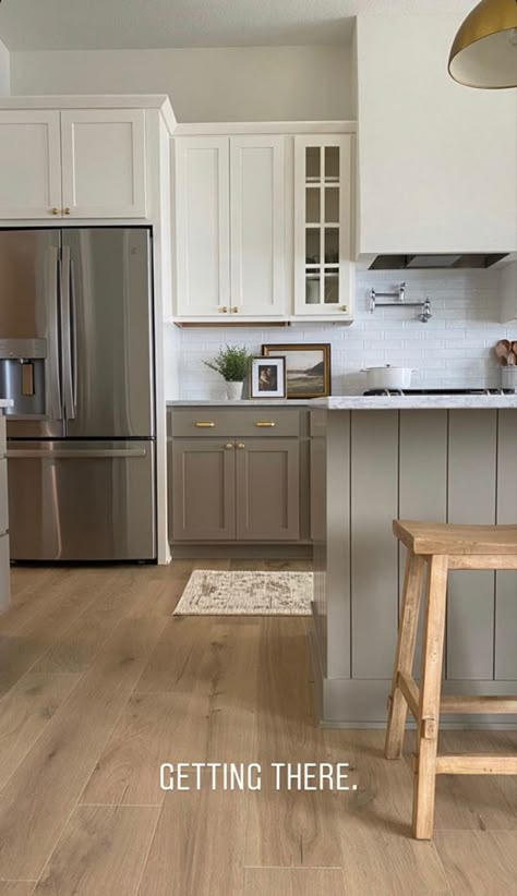 Mushroom Color Kitchen Island, Cool Toned Kitchen Ideas, Two Town Kitchen Cabinets, Two Tone Kitchen Cabinets Paint, Kitchen Living Room Colors, Kitchen Cabinet Color Ideas Neutral, Kitchen Stock Cabinets, Tri Color Kitchen, White Top Cabinets Beige Lower