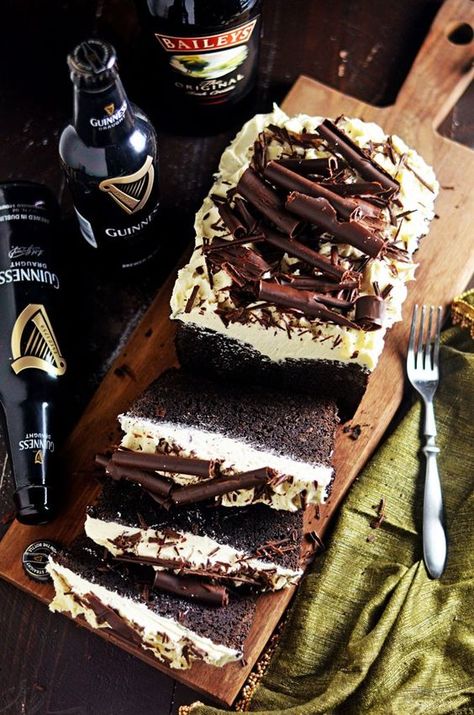 Malted Guinness Chocolate Cake with Baileys Frosting. This rich, dense, malted chocolate cake combines the flavors of Irish stout and dark chocolate for a perfect St. Patrick's Day dessert. The Baileys Irish Cream frosting is easy to make and takes this cake over the top. | hostthetoast.com March Desserts, Bailey Cake, Boozy Deserts, Baileys Irish Cream Frosting, Liquor Cakes, Baileys Frosting, Guinness Chocolate Cake, Irish Cream Frosting, Guinness Cupcakes