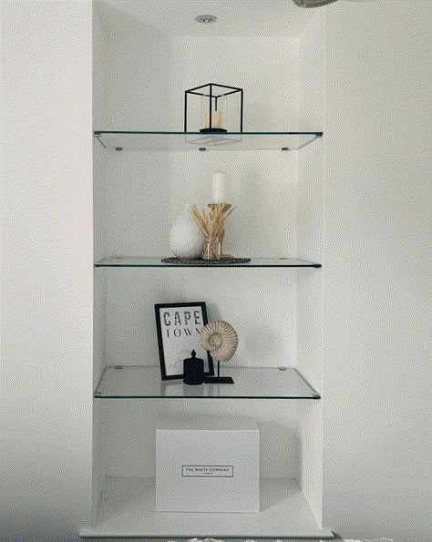 10 Home Decor Themes To Style With Glass Shelves | Dulles Glass Style Glass Shelves, Wall Niche With Glass Shelves, Glass Shelves Bedroom, Glass Wall Shelves Living Room, Glass Shelf Decor Living Room, Glass Shelves Bathroom, Glass Shelf Ideas, Glass Shelves Living Room, Glass Shelf Decor