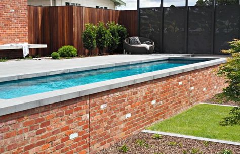 Highton Geelong red brick swimming pool Red Brick House With Pool, Backyard Daybed, Brick Paving Around Pool, Red Brick Around Pool, Red Brick Pool, Pool With Red Brick, Pool With Brick Wall, Red Brick Home With Pool, Pool Brick