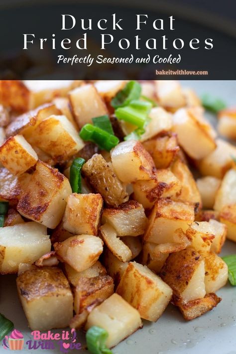 Crispy duck fat fried potatoes on a light green plate with chopped green onions as garnish. Fried New Potatoes, Duck Fat Potatoes Recipes, Home Fried Potatoes Breakfast, Crispy Duck Fat Potatoes, Duck Fat Roast Potatoes, Duck Fat Fries, Breakfast Sides, Home Fries, Duck Fat