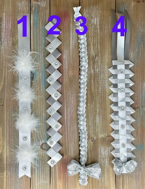 "I will not be able to offer free shipping because every order is different. IF SHIPPING PRICES ARE LOWER THAN SHOWN, I will refund you the difference 💖💖This listing is for add ons for homecoming mums, Ribbons with text, braids, loops, etc DETAILS These homecoming mum add ons are handmade so they might differ slightly. Trinkets are made with multi-layered cardstock so they are pretty sturdy. All pieces of Trinkets are cut and glued. These are not printed. Colors can be changed. HOW TO ORDER Wh Homecoming Mum Base, Mum Ribbon Ideas, Senior Mums Homecoming White, Hoco Braids, Homecoming Mums Braids, Homecoming Mums Ideas Unique, Mums For Homecoming, Senior Homecoming Mums, Graduation Candy Lei