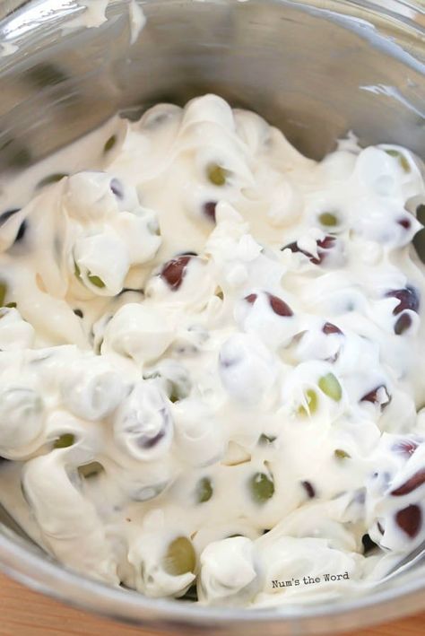 This easy Grape Salad will quickly become one of your favorite side dishes! This simple fruit salad takes only minutes to create and despite sounding odd, is really quite delicious! #sidedish #dessert #fruitsalad #grape #grapesalad #salad #creamcheese #brownsugar #pecans #sourcream #greekyogurt #minnesotagrapesalad #creamcheesegrapesalad #recipe #numstheword Grape Salad Dressing, Creamy Grape Delight, White Salad Dessert, Grape Salad With Marshmallow Cream, Grape Salad With Cool Whip, Easy Grape Salad Recipes, Grape Salad Recipe With Cool Whip, Eyeball Salad, Snow Grapes