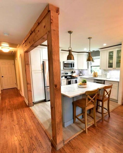 Support Beam Kitchen Island, Breakfast Bar Between Kitchen And Living Room, Wood Beam Between Kitchen And Living, Support Beam In Kitchen Island, Supporting Beam Ideas, White Kitchen With Wood Beams, Kitchen Island With Beam Support, Support Beam In Kitchen, Kitchen With Post