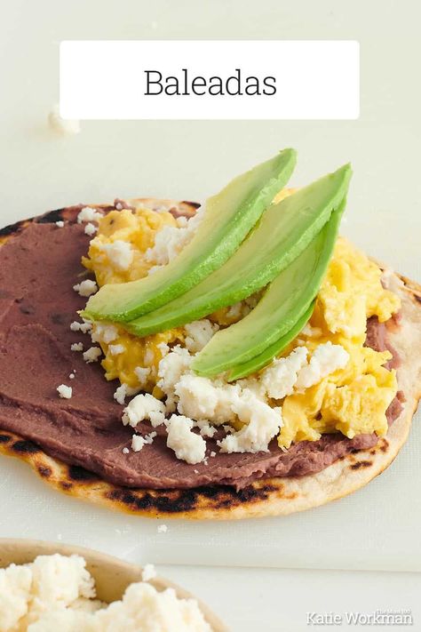 Baleadas Recipe / This Honduran dish of flour tortillas, refried beans, cheese, scrambled eggs, and sour cream is infinitely satisfying and craveable.⁠ #mealplanning #pantrycooking #30minutemeals #vegetariandinner #vegetarianmeals Baleadas Honduras Recipe, Honduran Breakfast, Baleadas Honduras, Cheese Scrambled Eggs, Latin American Food, Pork Shoulder Roast, Breakfast Goodies, Kinds Of Cheese, How To Cook Pork