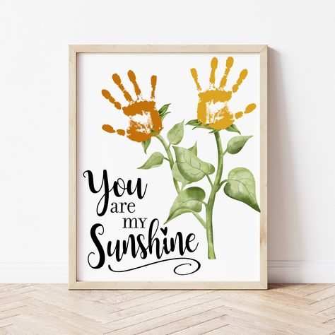 Flower Handprint Art | You Are My Sunshine Handprint Craft | Ollie + Hank Mothers Day Canvas Painting Ideas Handprint, Flower Hand Print Crafts For Kids, Spring Crafts For Kindergarten, Crafts For Prek, Craft For Grandma, Sunflower Handprint, Spring Handprint Art, Sunshine Handprint, Kindergarten Spring Crafts