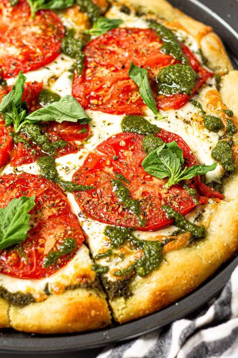 This pesto pizza recipe is better than take out and comes together in less than 20 minutes! Use refrigerated pizza dough from the store or my quick and easy pizza dough recipe along with all those ripe tomatoes and overgrown basil from the garden! Quick And Easy Pizza Dough, Making Pesto, Best Pesto, No Knead Pizza Dough, Easy Pizza Dough Recipe, Pesto Pizza Recipe, Nut Free Pesto, Make Pesto, Dairy Free Pesto