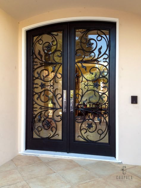 Beautiful ornate doors crafted from a custom design for this opulent Hope Ranch residence. #Steel #Glass #Custom #French #Door #Unique #Design Unique Doors Entrance, Wrought Iron Front Door, Unique Front Doors, Steel French Doors, Glass Door Design, House Front Door Design, Iron Front Door, Modern Exterior Doors, Iron Entry Doors