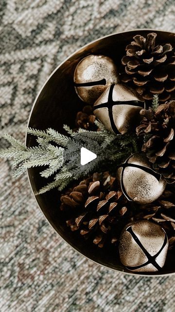 Steph Fischer | OFFISCHERLY HOME on Instagram: "DIY Holiday Bowl Filler ✨ I love using these #gifted brass hammered bowls in my decor year round and wanted to incorporate them into my holiday decor. 

It’s so easy to create beautiful filler! I used some clippings from an old greenery stem as my base and added pinecones and bells on top. For the smaller bowl, I simply just added pinecones. It’s that simple and beautiful! 

Want to shop my home? You can follow me on the @shop.LTK app / link in bio 🤍 and always feel free to shoot me a DM! 

#pokoliving #pokopartner #christmasdecor #holidaydecorating #diychristmasdecor #diyhomedecor #neutralchristmas #makehomematter #christmasdecorating #ltkholiday #ltkhome #howyouhome" Decor Bowl Filler Ideas, Christmas Bowl Fillers Ideas, Ornaments In Bowl, Christmas Dough Bowl, Christmas Bowl Fillers, Decorative Bowl Filler, Holiday Bowl, Christmas Bowl, Diy Bowl