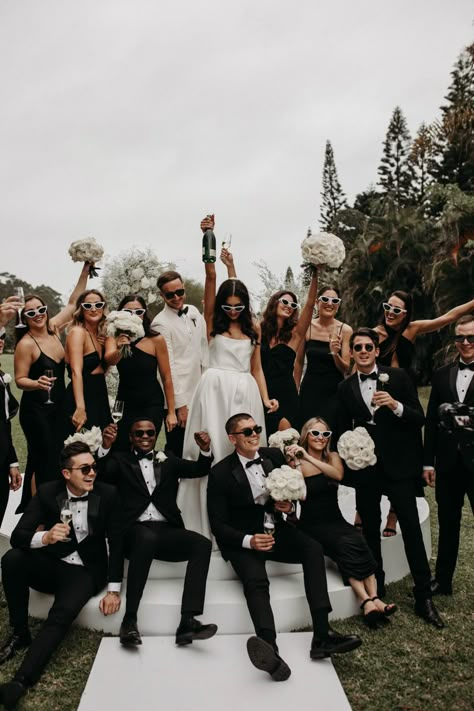 Aleena lena bridal gown, south africa, wedding , sunglasses, champagne, white roses Wedding Pictures Ideas With Bridesmaids, Modern Wedding Bridal Party, Modern Bridal Party Photos, Wedding Photo Set Up, Off White Bridal Party, Whimsical Black Tie Wedding, Black And White And Champagne Wedding, Fun Bridal Party Wedding Photos, All White Groomsmen Attire