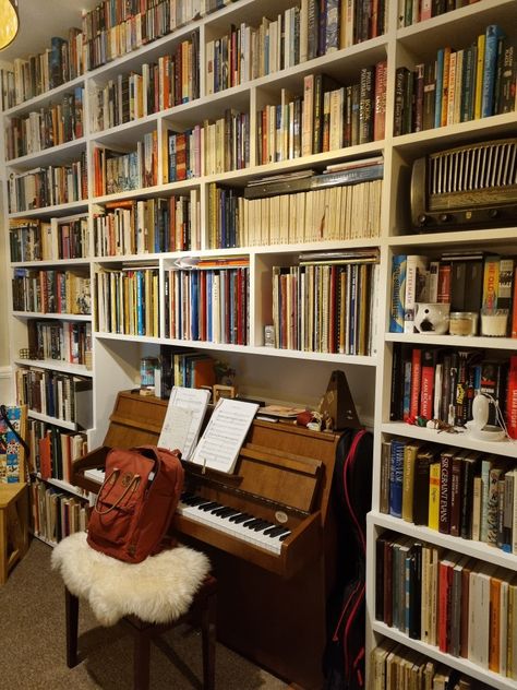 Bookshelves and Piano Music Shelves Over Piano, Piano Shelves, Library And Music Room Ideas, Piano Between Bookcases, Piano In Playroom, Home Library With Piano, Piano At Home, Piano And Bookshelves, Piano Library