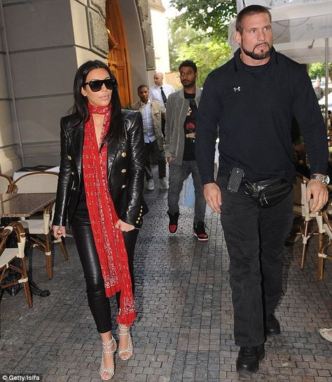 When Kanye's away... Kim Kardashian West is accompanied by a burly security guard as she mooches around shops in Prague Bodyguard Security Outfit, Security Outfit, Bodyguard Security, Kanye West Show, His Wedding Band, Bodyguard Services, Smart Guy, Grand Theft Auto Series, Lorraine Schwartz