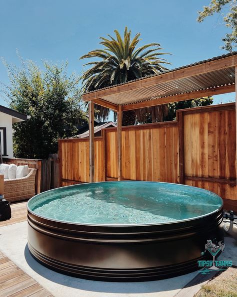 Keeping it “Bougie” around here with our Classic Black 10ft Stock Tank Pool😎💦 (someone said we are bougie so we are rolling with it 😆). This beauty Is now settled in its new home in 📍Oakland, CA ⋯☀⋯ ⋯☀⋯ ⋯☀⋯ DM us for details. #tipsytanks #tipsytankpools #stocktankpool #stocktank #tankuzzi #minipool #poolsofinstagram #smallpools #wadingpool Black Stock Tank Pool, Heated Stock Tank Pool, Pool Metal Tub, Tiled Stock Tank Pool, American Whirlpool Hot Tub, Tank Pool, Mini Pool, Stock Tank Pool, Stock Tank