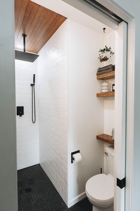 A Beautiful DIY Modern Small Bathroom! This small ensuite is transformed into a beautiful space! Beautiful design ideas with a shower in the space! We turned a corner of a room into a tiny bathroom that is full or storage and organization. Genius design space saving, and tips in this remodel! Featuring a wood shower ceiling, 3D tiles, floating shelves, and an IKEA hack godmorgon vanity! Sharing the design layout, dimensions, and inspiration. Simple decor in this contemporary bathroom with a ... Small Space Ensuite, Small Space Full Bathroom Ideas, Storage Areas In House, Full Bathroom Shower Ideas, Small Shower Dimensions, Tiny Bathroom Ideas Modern, Small Shower Room Ideas Space Saving, Tiny Ensuite Bathroom Ideas, Full Shower Bathroom