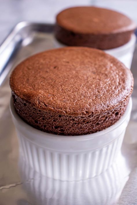 This easy to follow recipe for homemade chocolate soufflés hails from the Ritz Paris, so you know it's the real deal! These soufflés are gluten-free. Souffle Recipes Easy, Paris Chocolate, Souffle Recipe, The Ritz Paris, Belgian Food, Souffle Recipes, Ritz Paris, Chocolate Souffle, Single Serve Desserts