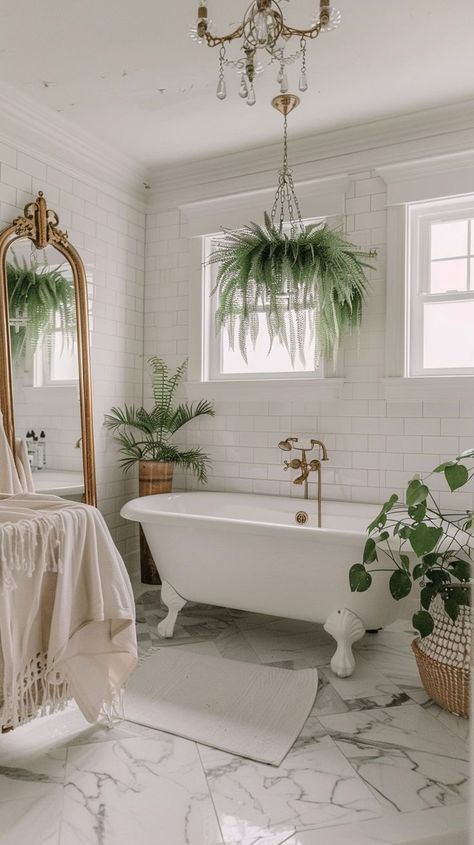 Luxurious bathroom with freestanding bathtub, marble flooring, natural light, and greenery - opulent and elegant design Bathtub Mirror, Styled Bathroom, Stand Alone Tub, Bathroom Fireplace, Gold Fixtures, Marble Flooring, Freestanding Bathtub, Design Bathroom, Elegant Bathroom