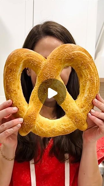 Maegan Brown ~ The BakerMama on Instagram: "JUMBO SOFT PRETZEL 🥨 store-bought or homemade pizza dough gets stretched into a 50” rope to create this shareable, soft pretzel that no one can resists as it comes out of the oven! RECIPE BELOW ⬇️ 

Comment “dough” and I’ll DM you the recipe for my quick and simple pizza dough! 🍕 #TheBakerMama

JUMBO SOFT PRETZEL 

Ingredients:
16 ounces prepared pizza dough
1 teaspoon baking soda
1 egg
water
coarse sea salt, for sprinkling

Instructions:
1. Preheat the oven to 400°F.
2. Roll the pizza dough into a 50-inch-long rope on a lightly floured surface.
3. Twist the rope into a pretzel shape on a parchment-lined baking sheet.
4. Microwave 2 tablespoons of water for 30 seconds, stir in 1 teaspoon baking soda.
5. Brush the baking soda mixture all over th Simple Pizza Dough, Simple Pizza, Soft Pretzel Recipe, Pretzel Shape, Easy Pizza Dough, Oven Recipe, Soft Pretzel, Pretzels Recipe, Homemade Pizza Dough