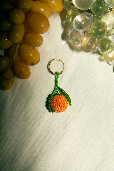 Same day shipping on Pura Utz beaded jewelry. Beaded Orange, Beaded Fruit, Fruit Beads, Key Holder Diy, Seed Bead Crafts, Beaded Scarf, Seed Beading, Fruit Earrings, Beaded Crafts