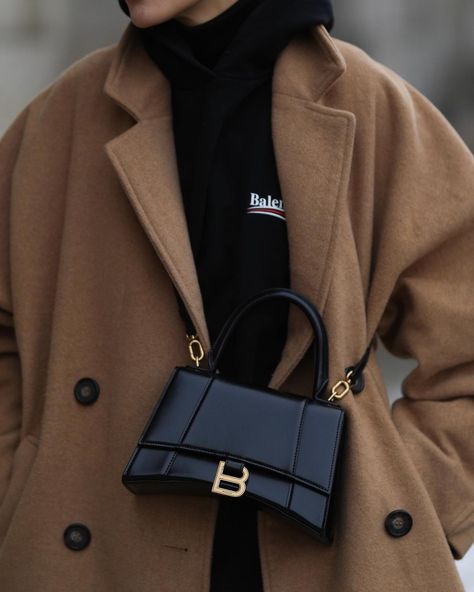 10 Best Designer Handbags under $1,000 • Petite in Paris Popular Gucci Bags 2022, Balenciaga Black Bag, Balenciaga Hourglass Bag Outfit, Balenciaga Bag Aesthetic, Balenciaga Bag Outfit, Handbag Balenciaga, Balenciaga Handbag, Balenciaga Hourglass Bag, Black Designer Bags