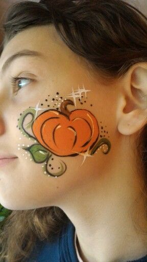 Simple little pumpkin design by Abby's Face Paint-N-Glitter Painting Illusions, Kids Halloween Face, Face Painting Halloween Kids, Halloween Face Paint Designs, Easy Halloween Face Painting, Pumpkin Face Paint, Easy Face Painting Designs, Cute Pumpkin Faces, Festival Face Paint