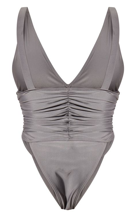 Have all eyes on you with this grey ruched waist high leg plunge swimsuit. This swimsuit is brought to you in a grey material with a ruched waist, a high leg fit and a plunge neckline, how could you say no? This swimsuit is everything and more we're loving paired with your sandals and gold accessories for a look like no other. Length approx 66cm/26inch (Based on a sample size UK 8) Model wears size UK 8/ EU 36/ AUS 8/ US 4Model Height - 5ft 5inchp]:!mb-0inch>Category: SwimwearProduct type: SwimsuitColour: GreyMaterial: SwimDesign: PlainOccasion: Day Grey Swimsuit, Plunge Swimsuit, Blueberry Pancakes, Plunge Neckline, Grey Material, All Eyes, Gold Accessories, The Grey, High Leg