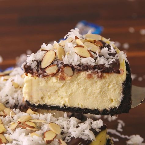 This almond joy candy bar cheesecake is full of your favorite chocolate and coconut flavors. Get the recipe at Delish.com. #delish #easy #recipe #almondjoy #candy #cheesecake #almondjoycheesecake #dessert Almond Joy Cheesecake, Coconut Chocolate Chip Cookies, Savory Cakes, Dessert Oreo, Almond Joy, Oreo Dessert, Cheesecake Bars, Savoury Cake, Cheesecake Recipes