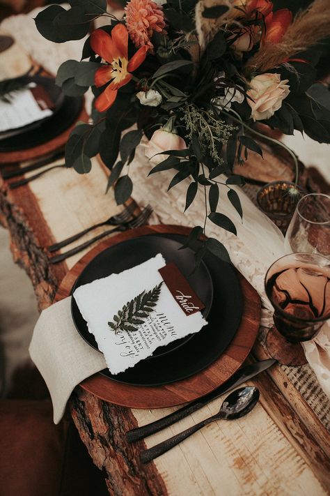 Unique Wedding Dresses 2023, Boho Winter Wedding Table Decor, Dark Rustic Wedding Color Schemes, Dark Moody Thanksgiving, Rustic Bohemian Wedding Table Decor, Fall Wedding Color Palette Black, Earthy Bohemian Wedding, Wooden Plates Wedding, Bohemian Food Table