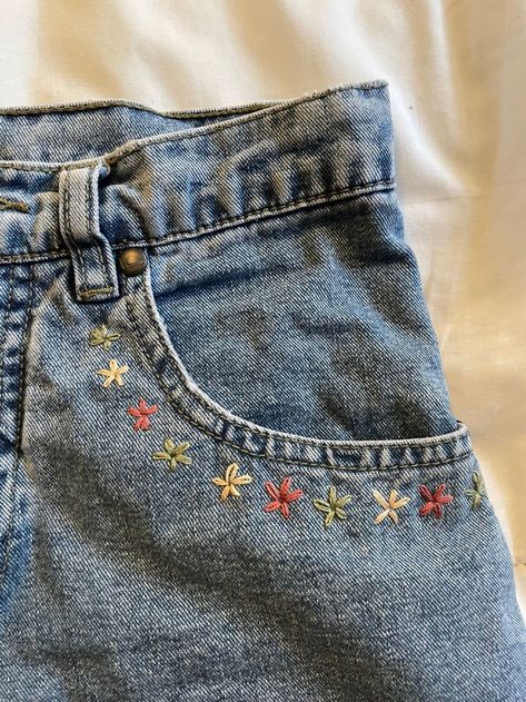 How To Sew A Flower On Jeans, Jeans Embroidery Flower, Denim Jeans Embroidery Diy, Embroidery Patterns Pants, Jeans With Embroidered Flowers, Flower Jean Embroidery, Embroidering On Jeans, Embroidery Designs In Jeans, Ideas For Embroidery On Clothes