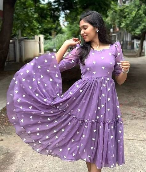 *PRICE :-899/-+shipping 1275 LAVENDER HEART 💜 Here's presenting you a perfect pretty fit for Party Wear The beautiful heart ❤️ All Over the Midi😍 Along With Complimenting neck line just makes its more beautiful 🤍❤️ Details ✓Material :- Georgette ✓Gown Length :- 48 ✓Sleeves Length :- 12" ✓Neckline Sweetheart MAXI SIZE :- M-38 L-40 XL-42 XXL-44 * Happy Shopping ❤️🛒 *YOU DESIRE ❤️ WE DELIVER 🎁* Georgette Sarees Frock Designs, Half Fork Dress Design, Jorjet Frock Designs Latest, Frock Neck Models, Full Sleeve Frocks For Women, Georgette Top Design, Gorget Frocks Design, Georgette Gown Designs, Georgette Floral Long Frocks