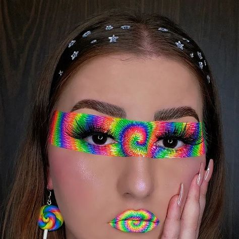 ♡ Jessie ♡ on Instagram: "Tape Makeup Trend: Tie Dye 🌈 IB: @maddys.makeup @anemariemua @beatsbydeb @lexinsherwood __________________________ Products: ✦ @makeupamurder | neon uv poison pigments ✦ @sheencosmeticsofficial | Sour Apple, Candy Floss, Butterscotch, Midnight Blue liners ✦ @suvabeauty | Acid Trip, Grape Soda & Space Panda hydra liners . . . . . . . . . . . . . . . . . . . #makeuplooks#creativemakeup#tiktoktutorial#makeuptutorial#graphicliner#pastelmakeup#hoodedeyes#makeuplook#linework#neonmakeup#neonliner#uvmakeup" Tape Makeup Trend, Tape Makeup, Uv Makeup, Space Panda, Apple Candy, Blue Liner, Grape Soda, Skin Color Palette, Candy Floss